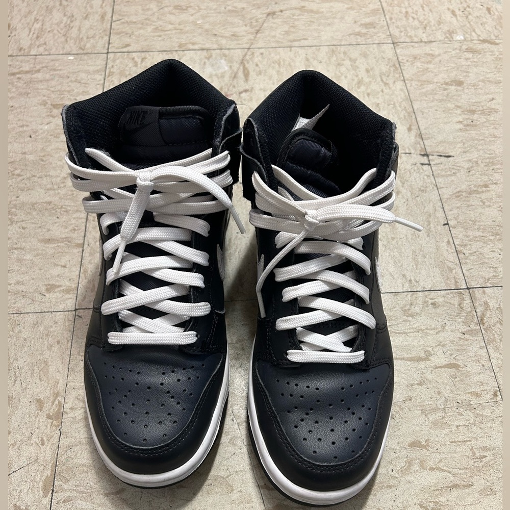 Black and white Nike shoes